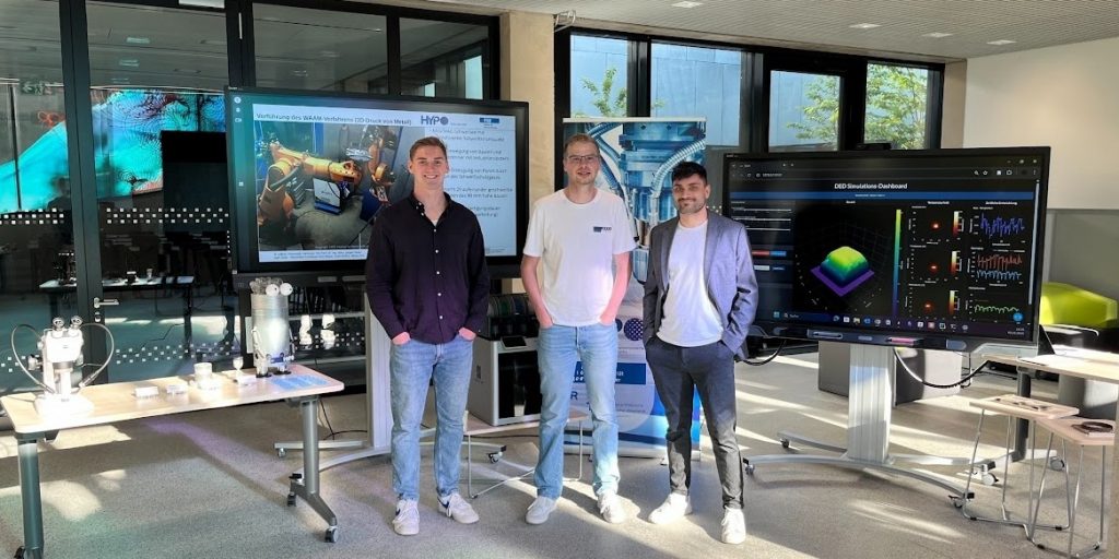 Beitragsbild: Lars Bachert, Marco Zimmermann und Maik Schürmann (v.l.n.r.) vom TRR 375 bei der